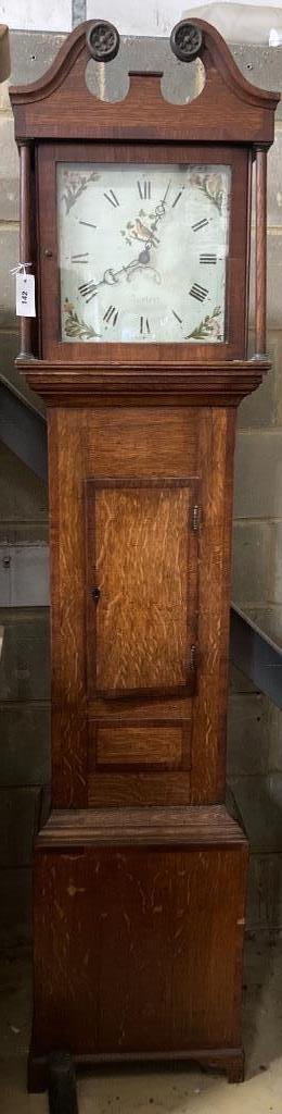 An early 19th century oak cased 30 hour longcase clock, height 207cm